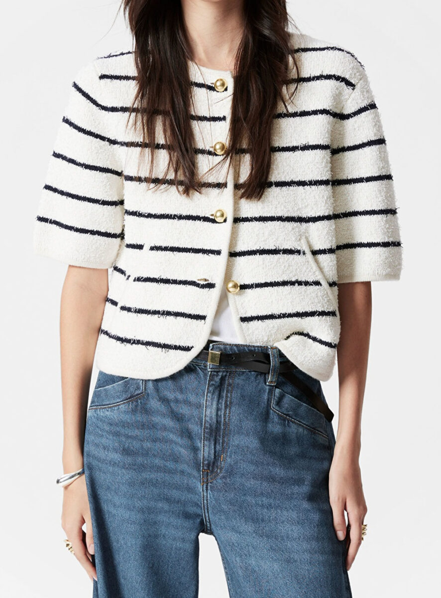 Questi cardigan a mezze maniche sono i protagonisti della Primavera Questi cardigan a mezze maniche sono i protagonisti della Primavera