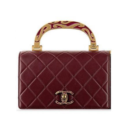 Kate Middleton all’incontro con i Trump con la Mini Chanel tanto odiata da Diana